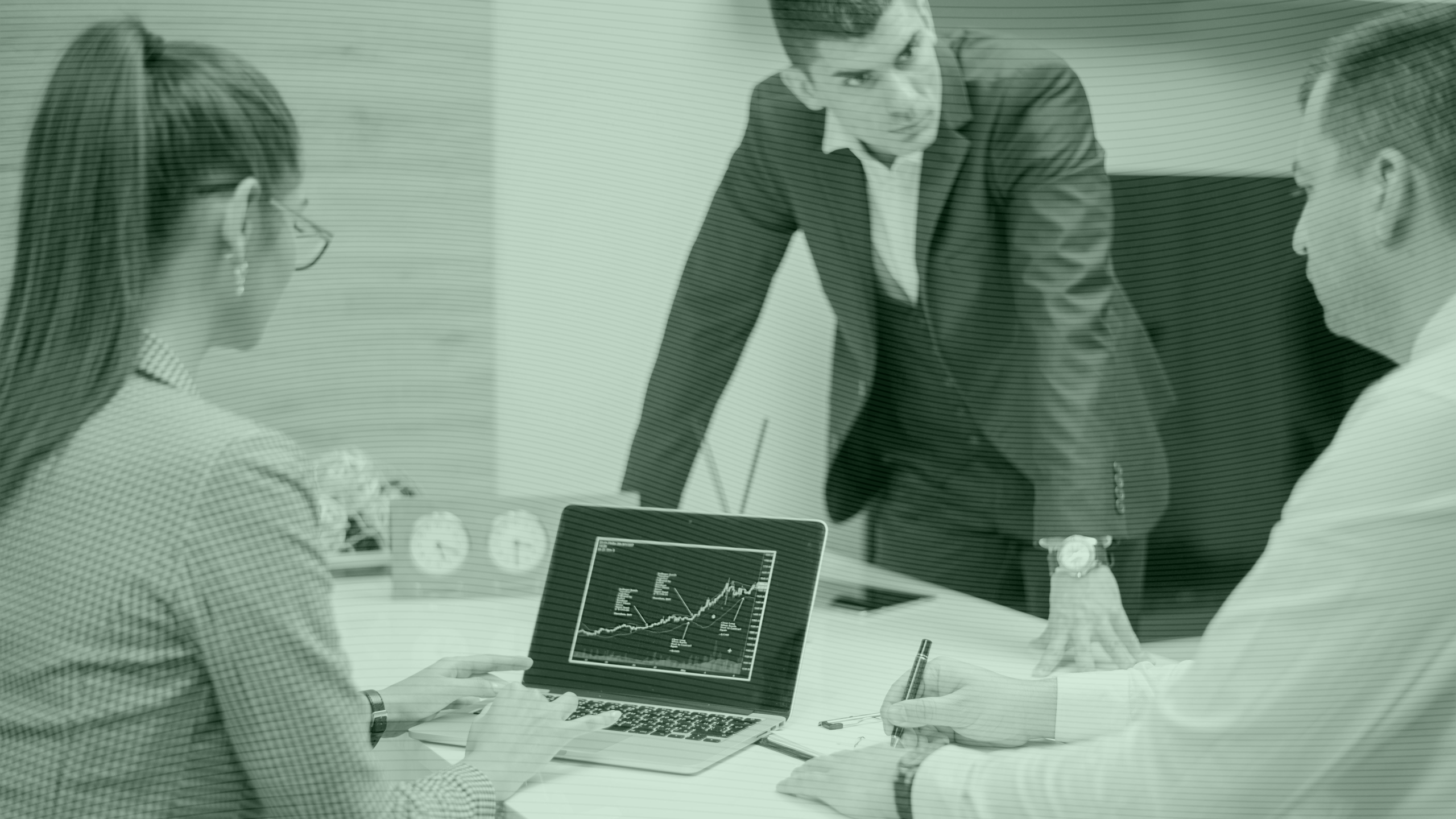 Photo of a financial advisor talking to his clients