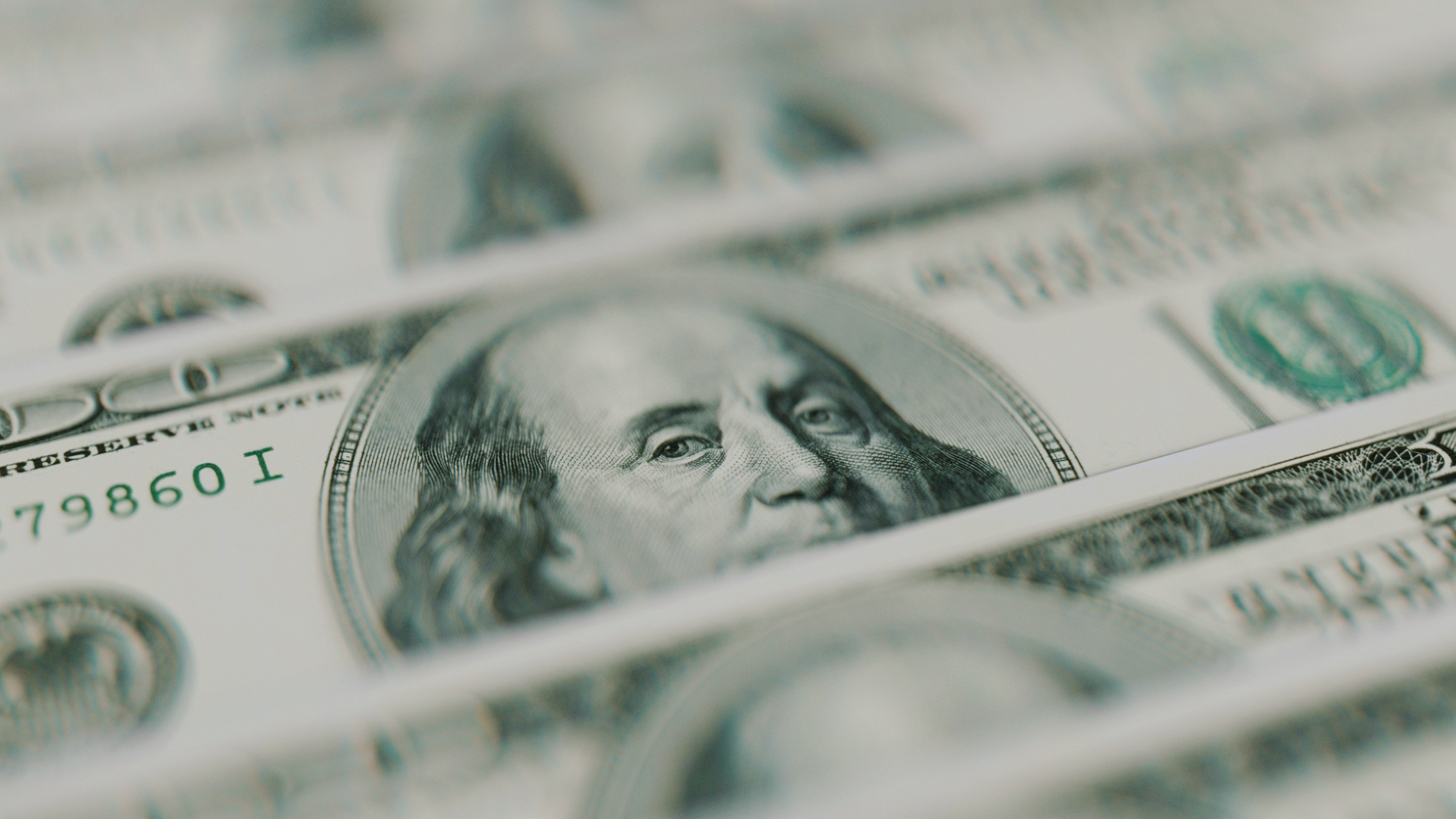 Close-up photo of a one hundred dollar bill